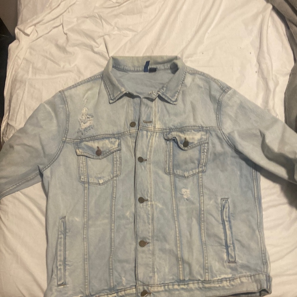 Distressed denim jacket